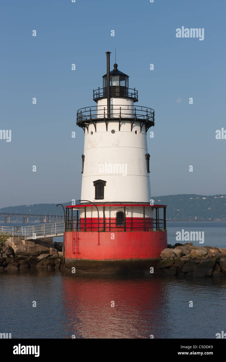 Early morning view of the Tarrytown Lighthouse under a waning gibbous moon Stock Photo