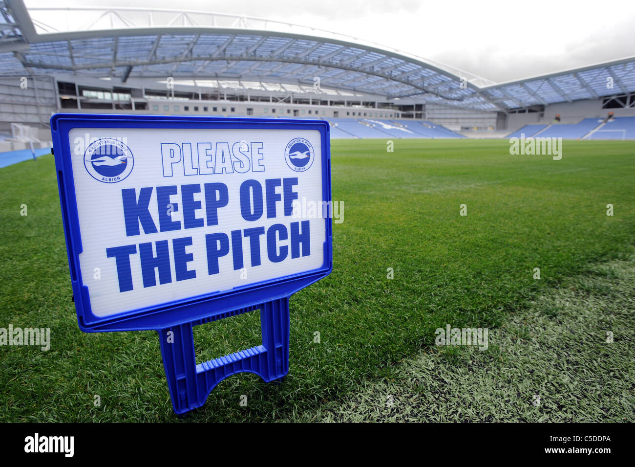 A please keep off the pitch sign inside the Amex Stadium the new home of Brighton and Hove Albion Stock Photo