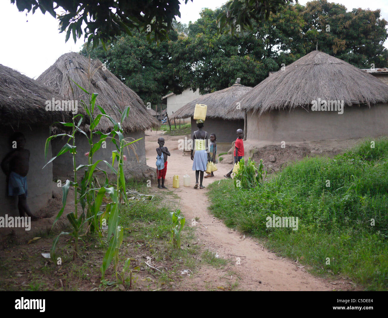 UGANDA Houses and children of Gulu. PHOTO by Sean Sprague Stock Photo ...