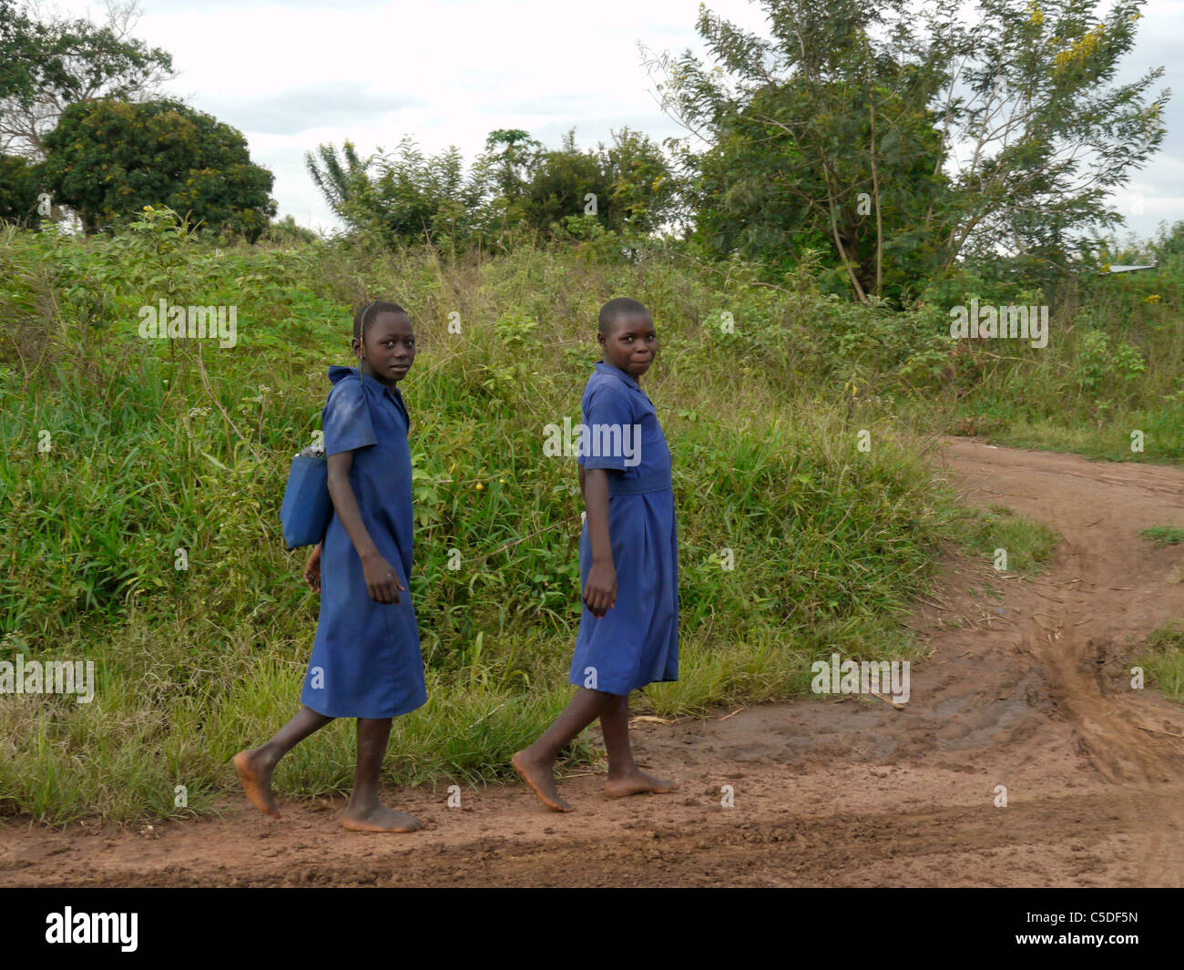 UGANDA Girls coming home from school, Lira. photograph by Sean Sprague Stock Photo