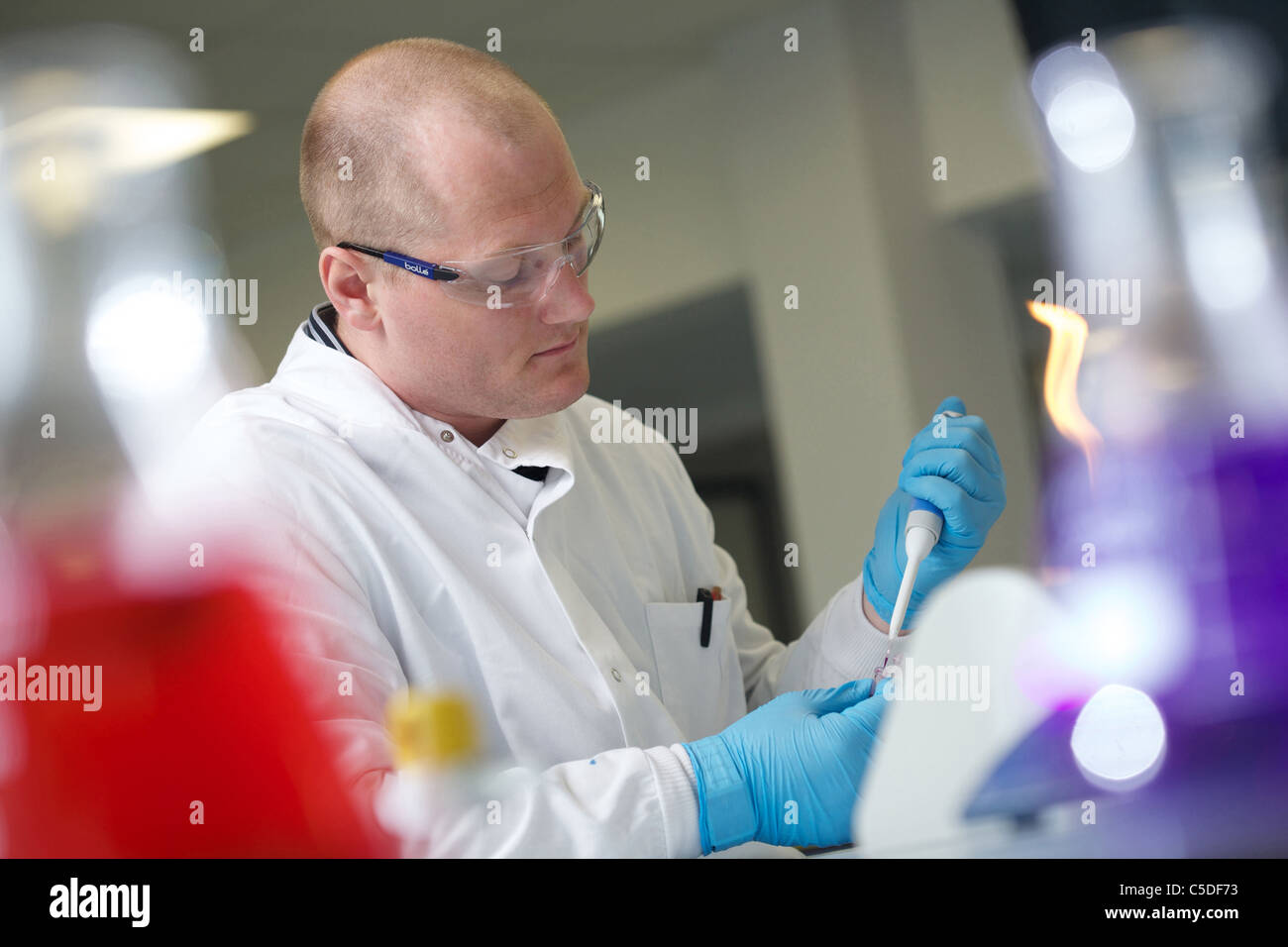 Wednesday 6th July 2011 Lab technician using a pipette at the Leeds Metropolitan University Bio