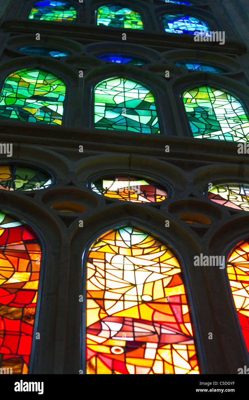 Stain glass window inside Antoni Gaudi's Sagrada Familia Stock Photo