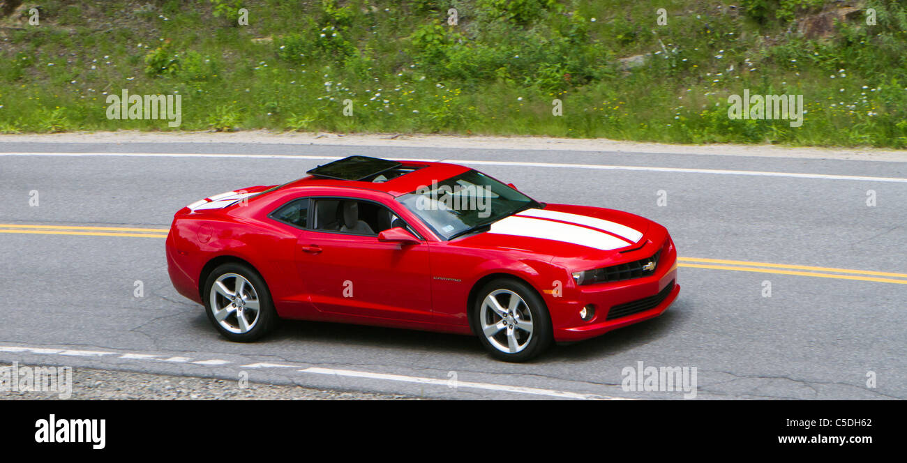 Red Chevrolet Camaro with white racing stripes Stock Photo - Alamy