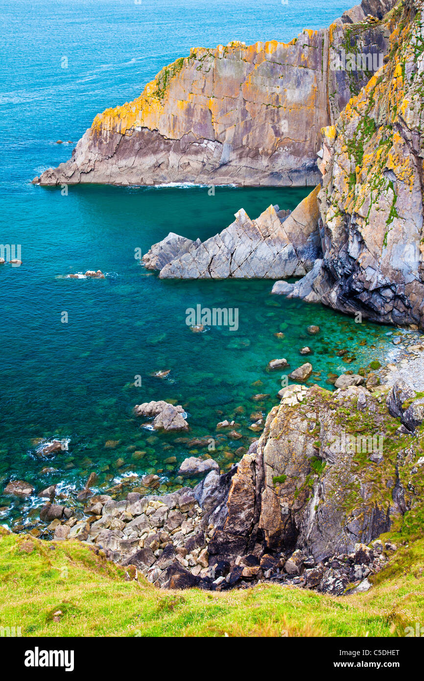Rocky coastline and cliffs at Baggy Point a headland near Croyde, North Devon, England, UK Stock Photo