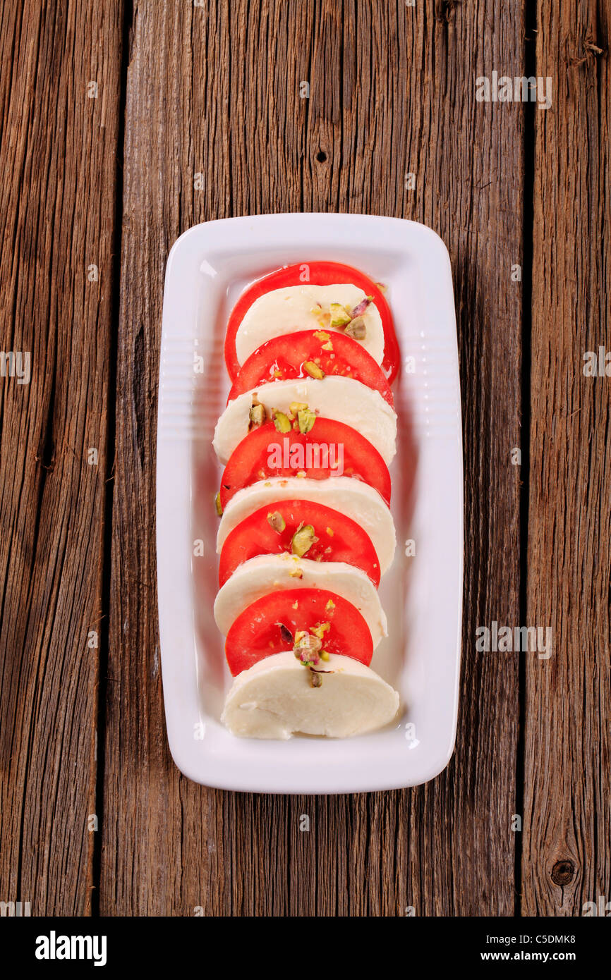 Slices of fresh tomato and mozzarella cheese Stock Photo - Alamy
