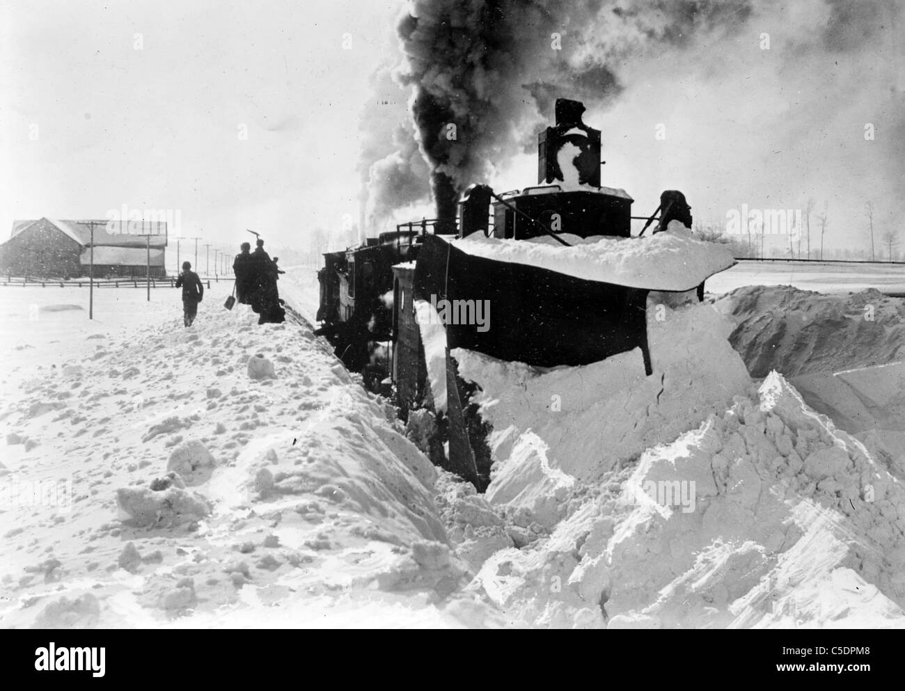 Snow plow in field in Michigan, USA Stock Photo