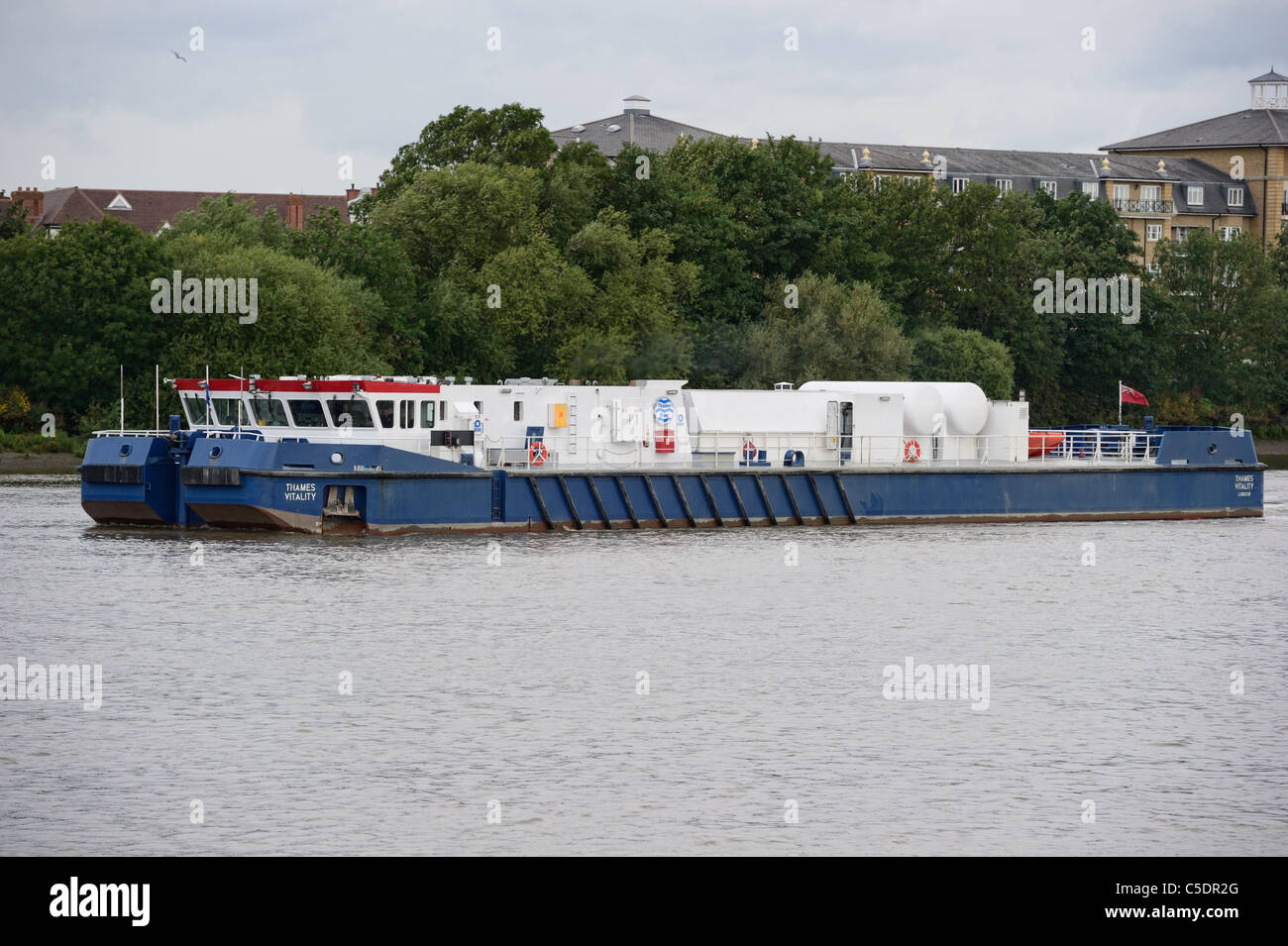 Thames Vitality, an oxygenation vessel operated by Thames Water, on the river Thames near Hammersmith, London, England, UK Stock Photo