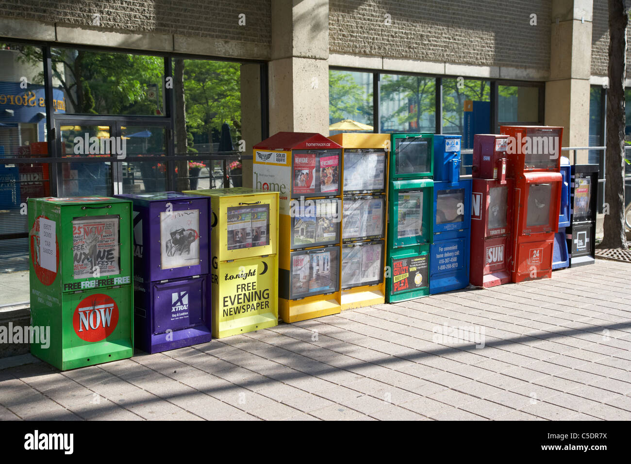 newspaper free and paid vending boxes toronto ontario canada Stock