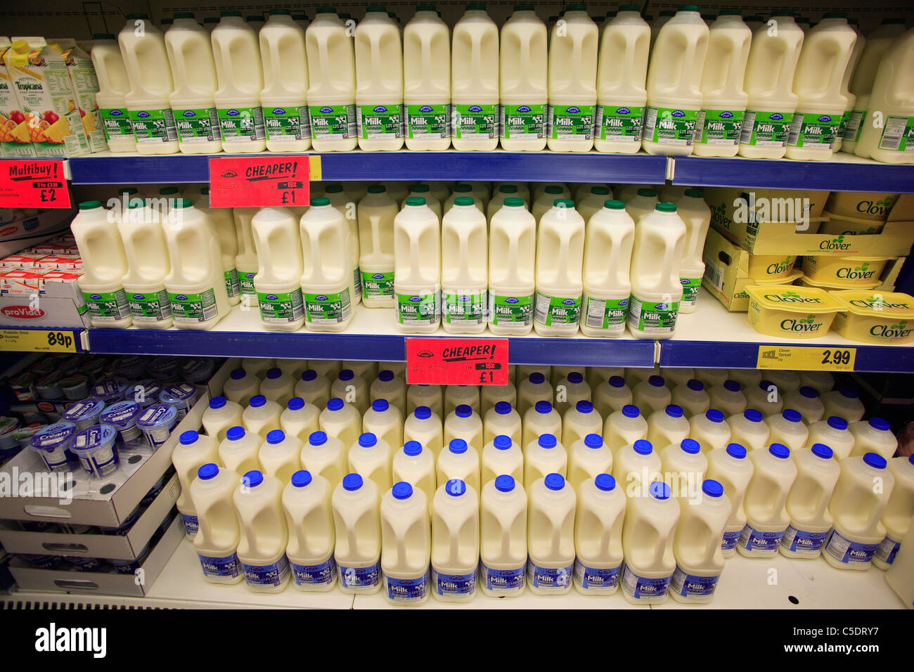 Milk & butter display in Lidl Stock Photo