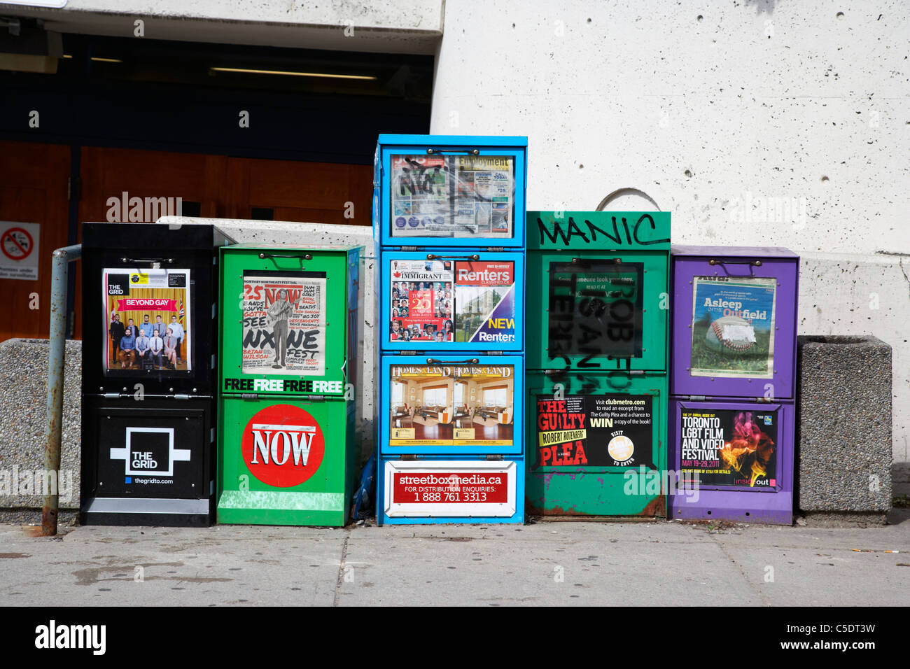 free newspaper vending boxes toronto ontario canada Stock Photo