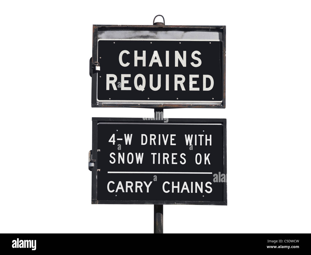Chains or snow tires required sign with mountain backdrop. Stock Photo