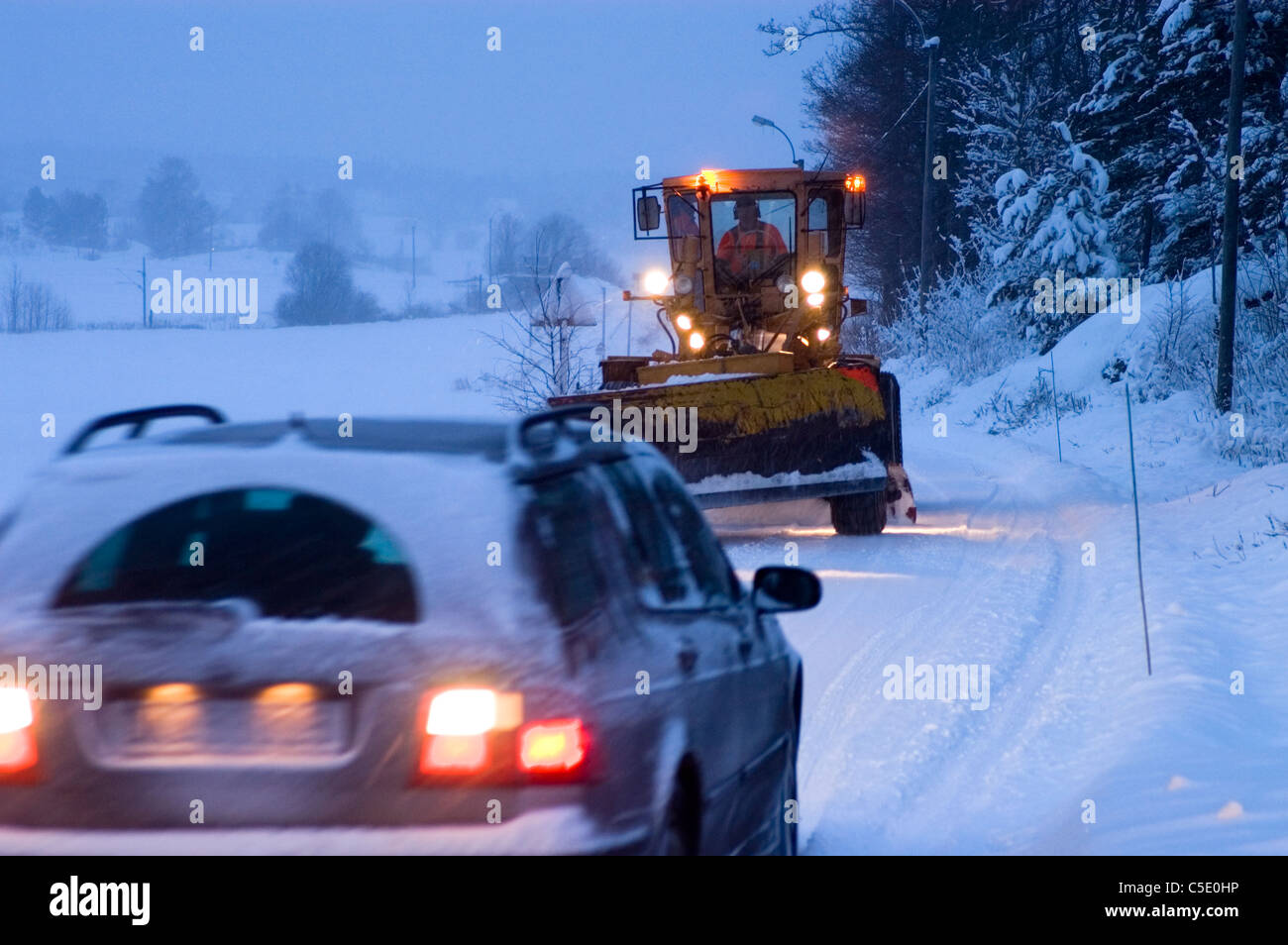 Car Evening Snow Country Road High Resolution Stock Photography and