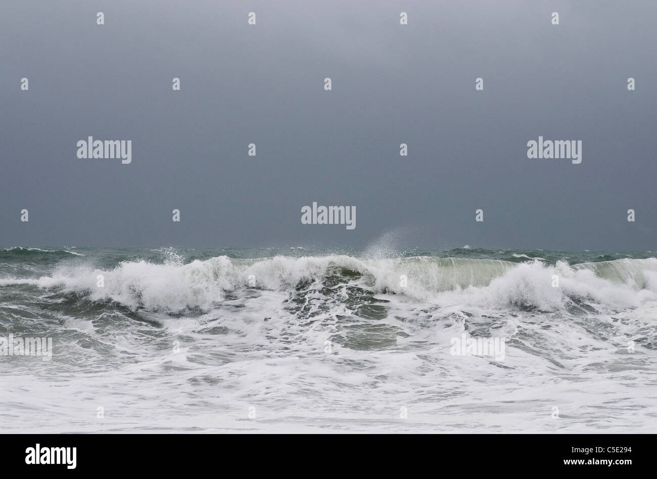 View of rough waves in sea against the sky Stock Photo