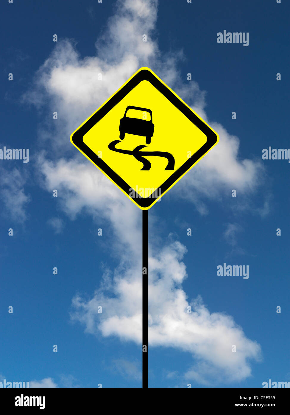 A road sign isolated against a blue sky Stock Photo - Alamy