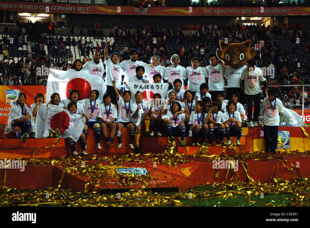 Japan team celebrates with the trophy after winning the FIFA Women's