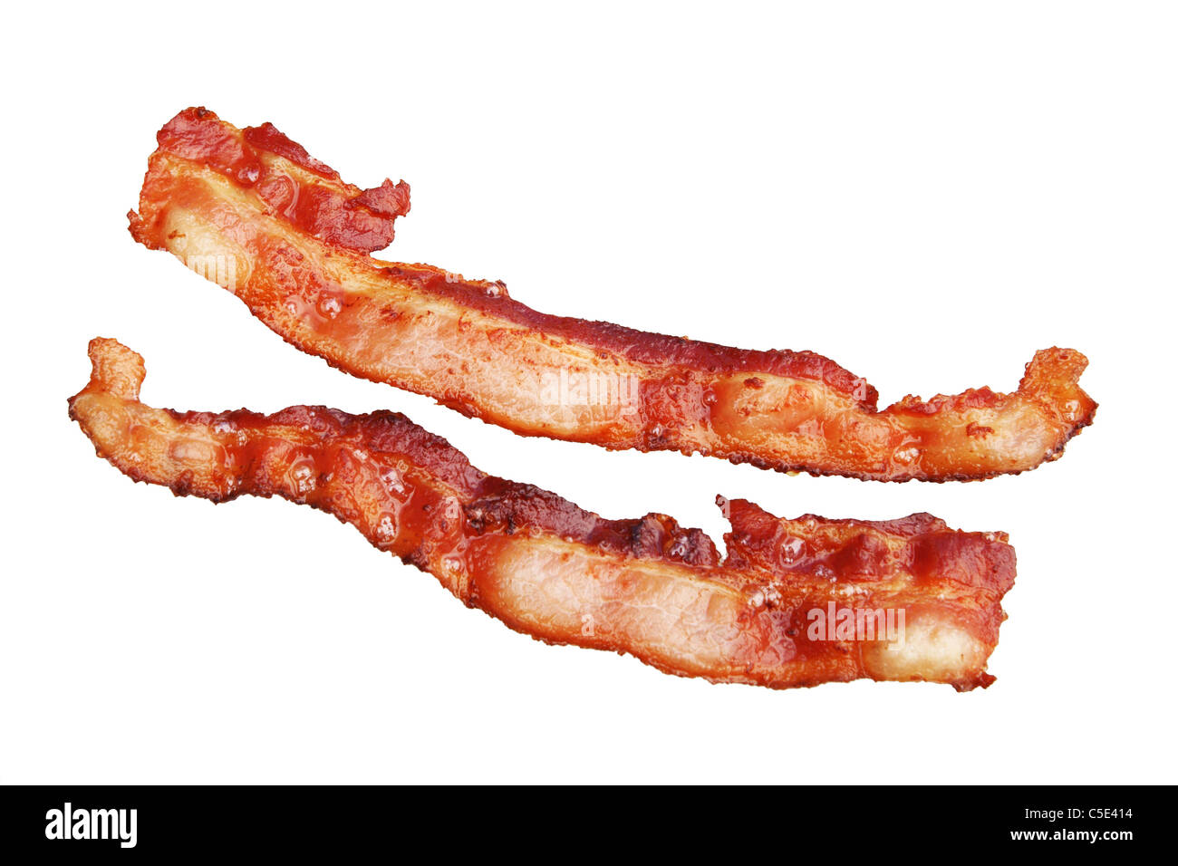 two strips of cooked bacon isolated on white background Stock Photo