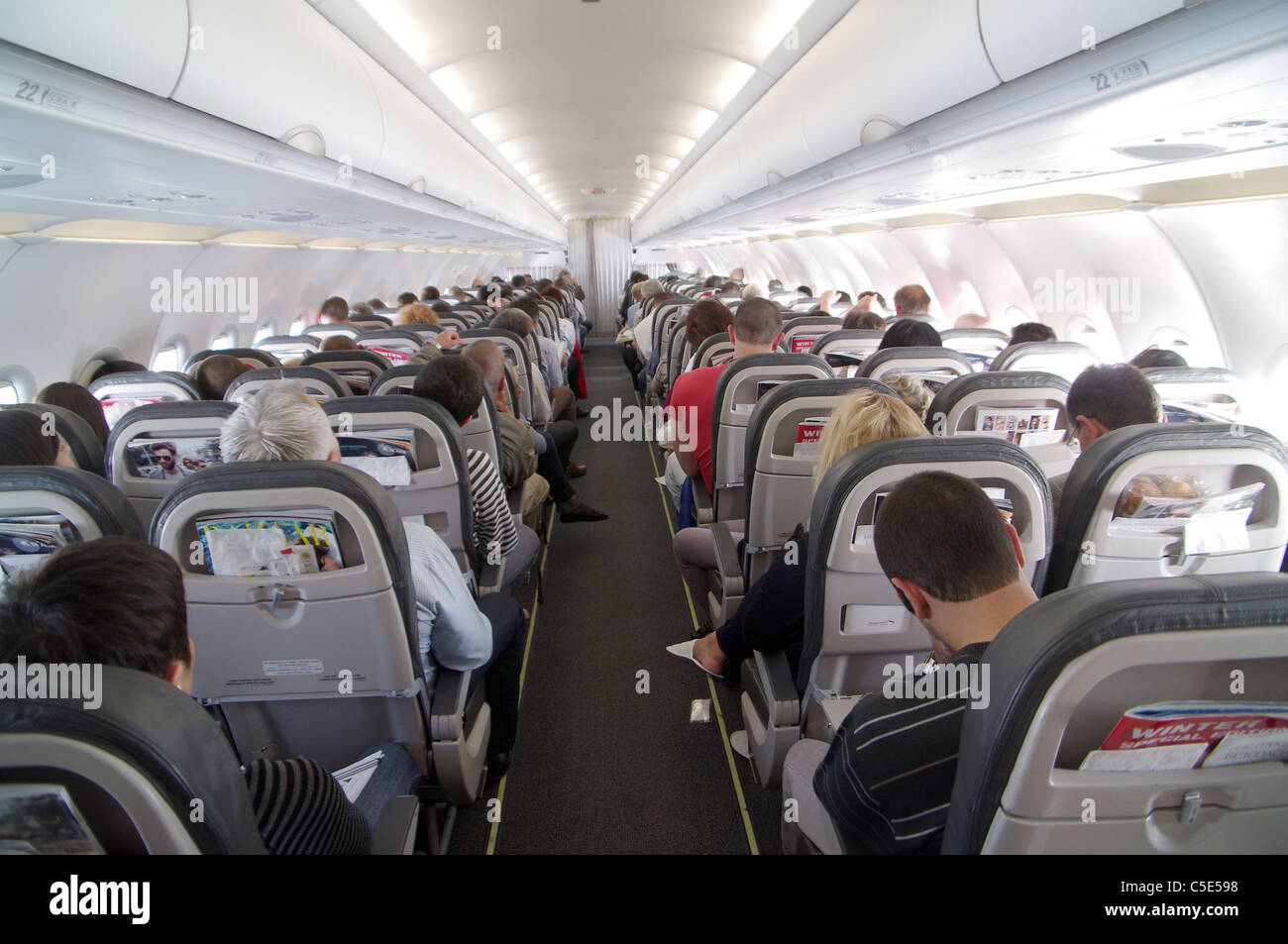 Passenger compartment of an airplane Stock Photo Alamy