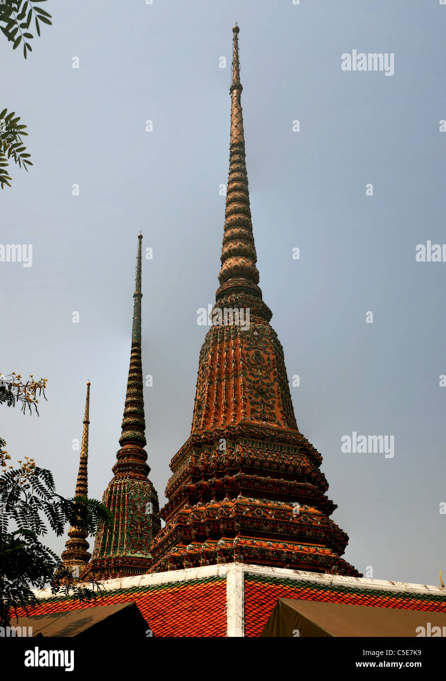 Chedi rising above the roof at Wat Pho, Thailand Stock Photo