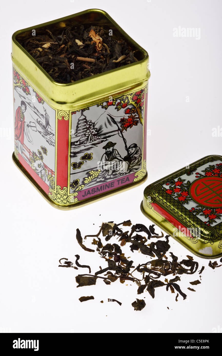 Small tin of jasmine tea against a pure white background Stock Photo