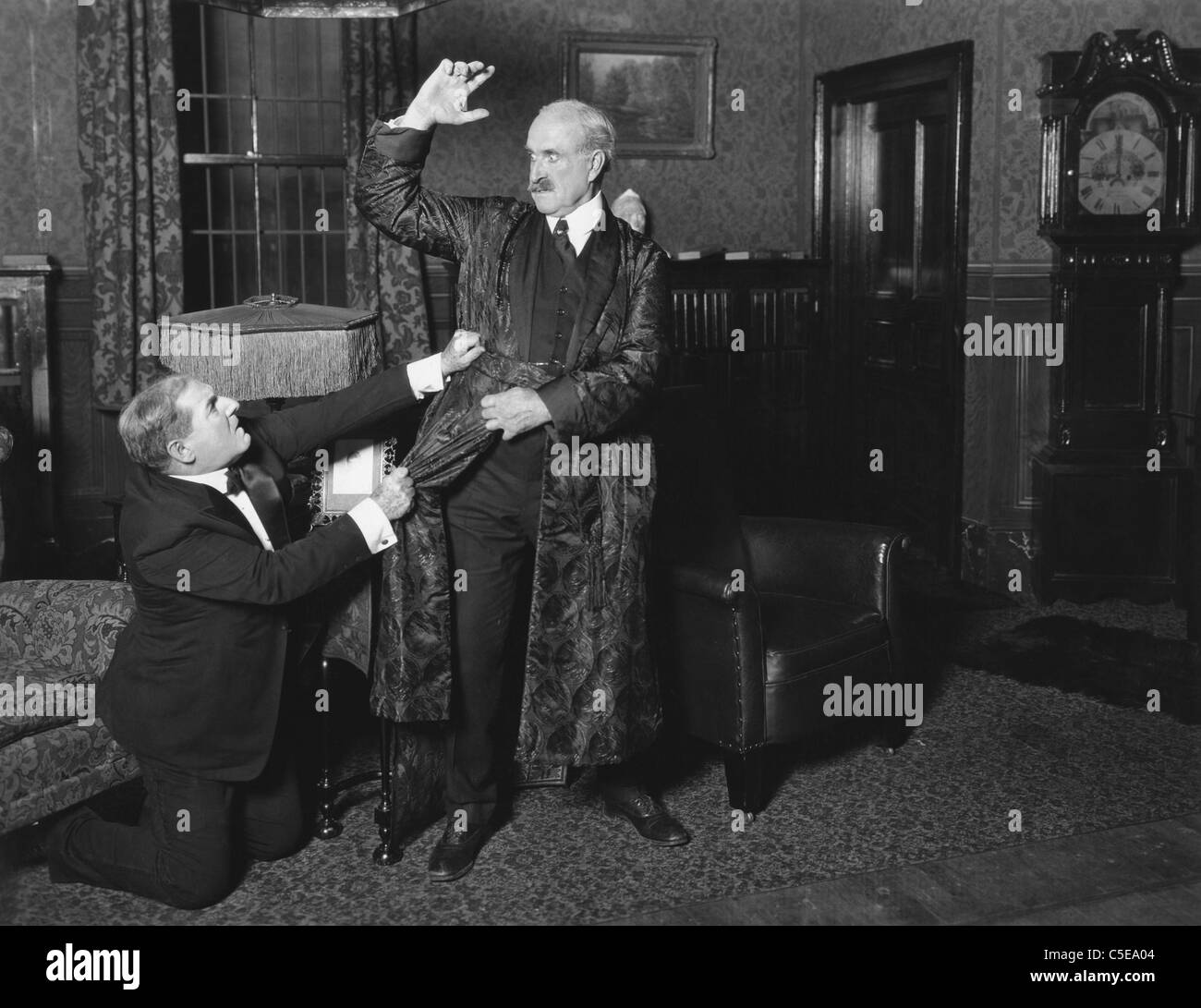 Man apologizing on hands and knees Stock Photo Alamy