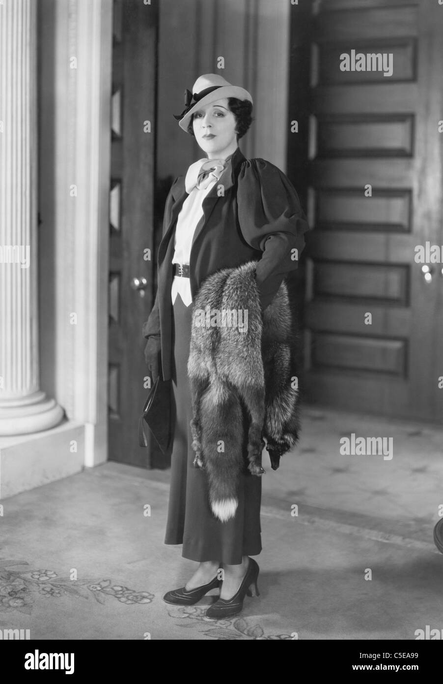 Portrait of elegant woman with fur coat Stock Photo - Alamy