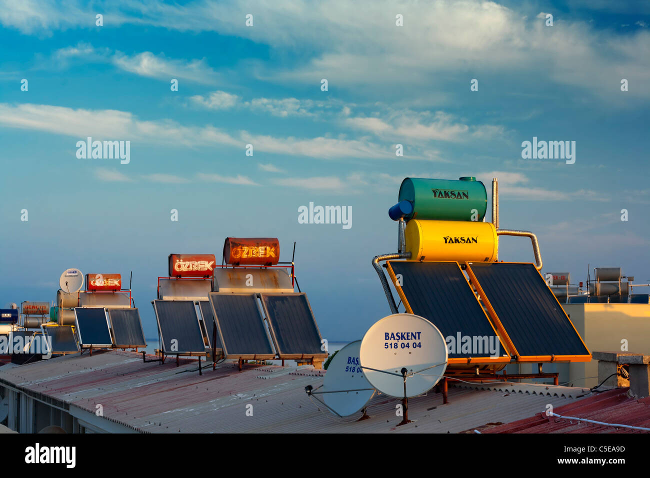 Rooftop hot water solar heating systems Stock Photo Alamy