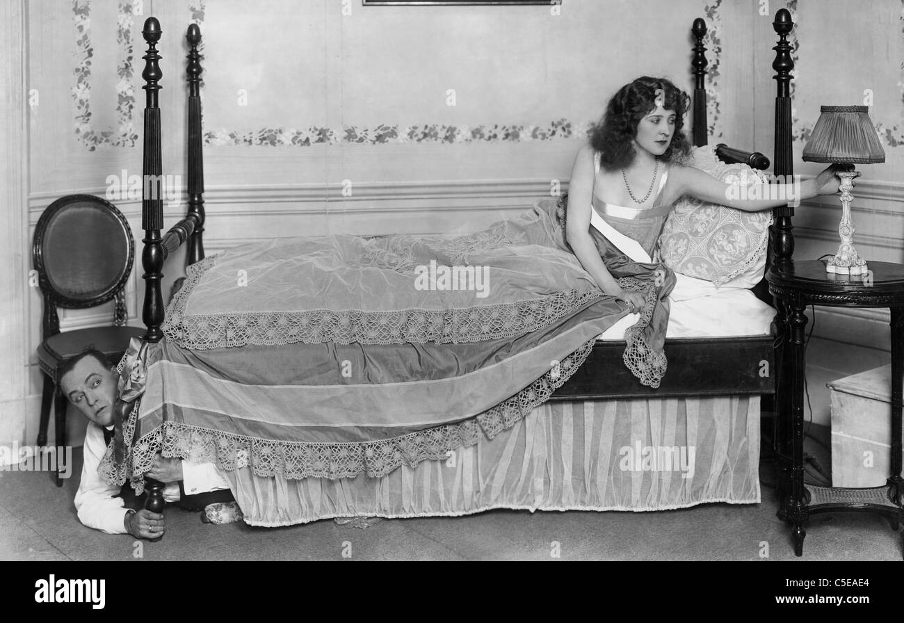 Hiding under bed Stock Photo Alamy