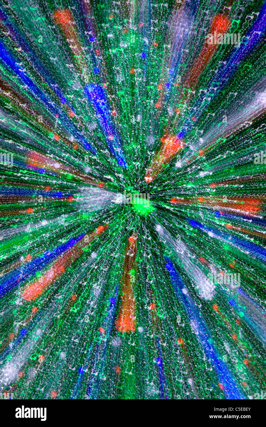 An original abstract artwork of a Christmas tree that looks like a burst of colorful rays of light Stock Photo