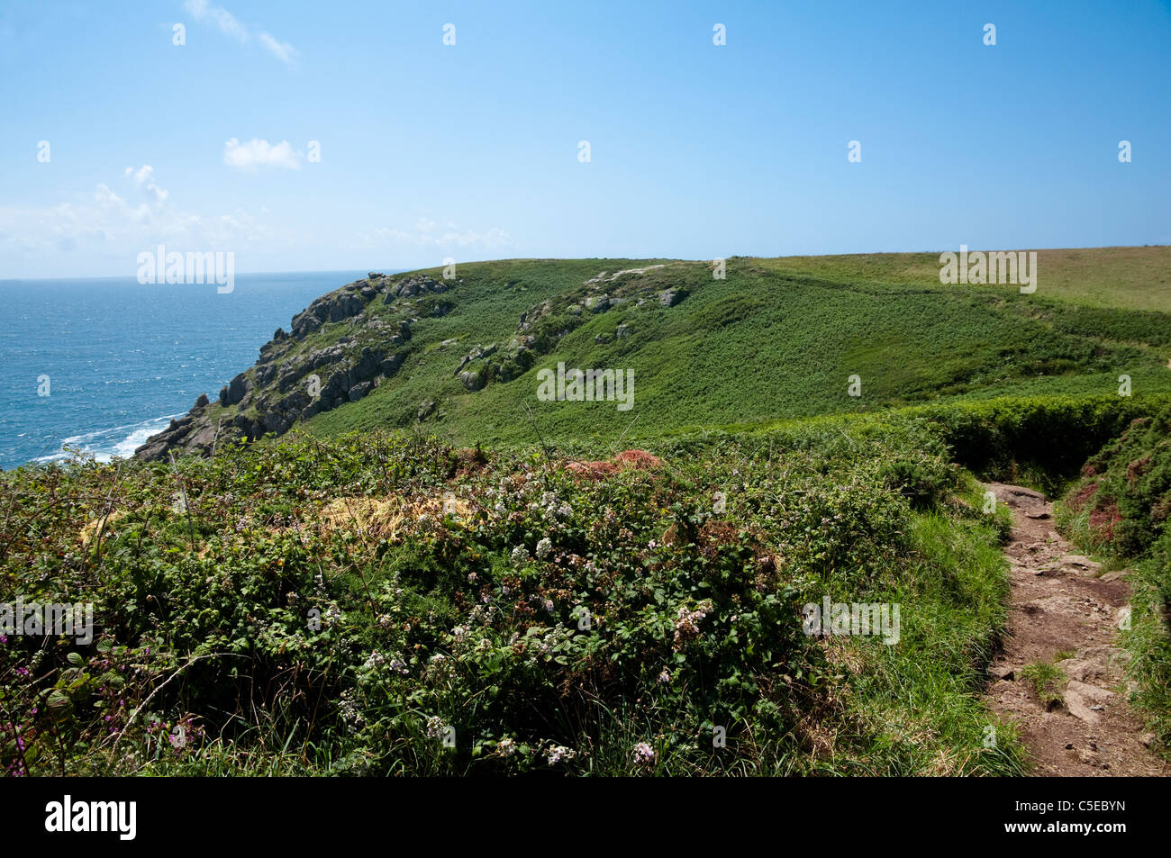 SW Coastal Path - footpath along the Cornish coast, heading towards St Levan, Penwith, Cornwall. Stock Photo