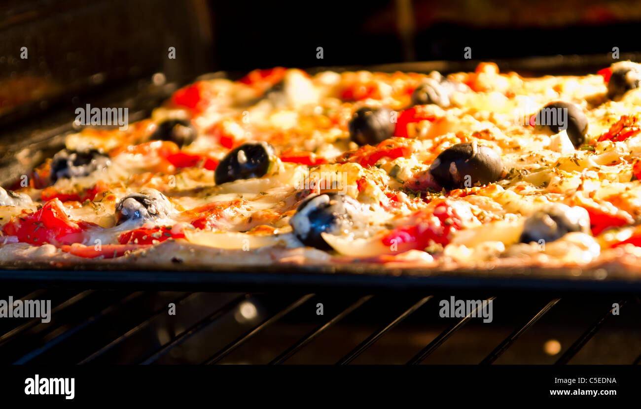 Pizza made to Domestic Kitchen in oven Stock Photo