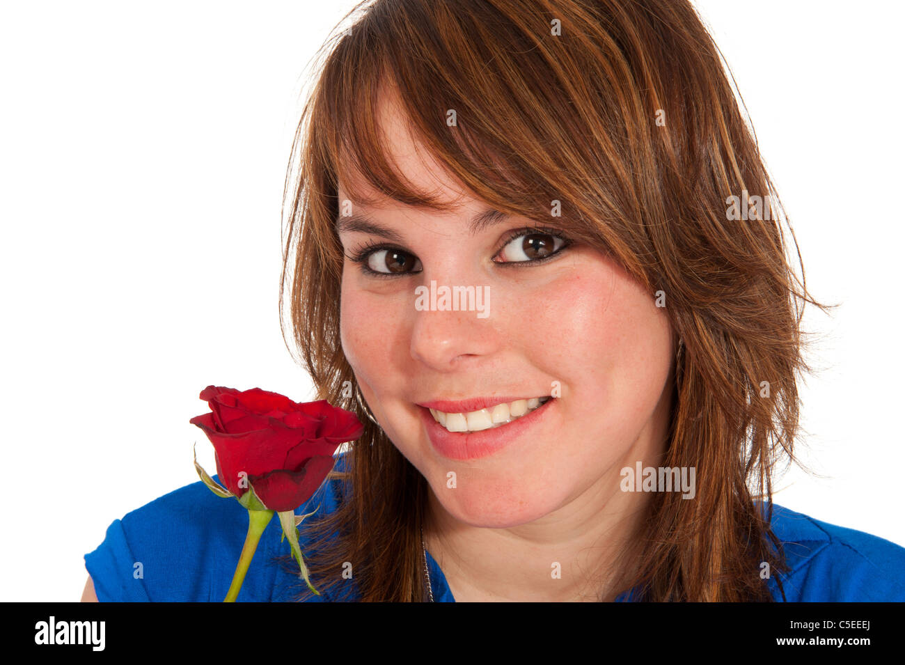 Portrait of an attractive girl with red rose Stock Photo - Alamy