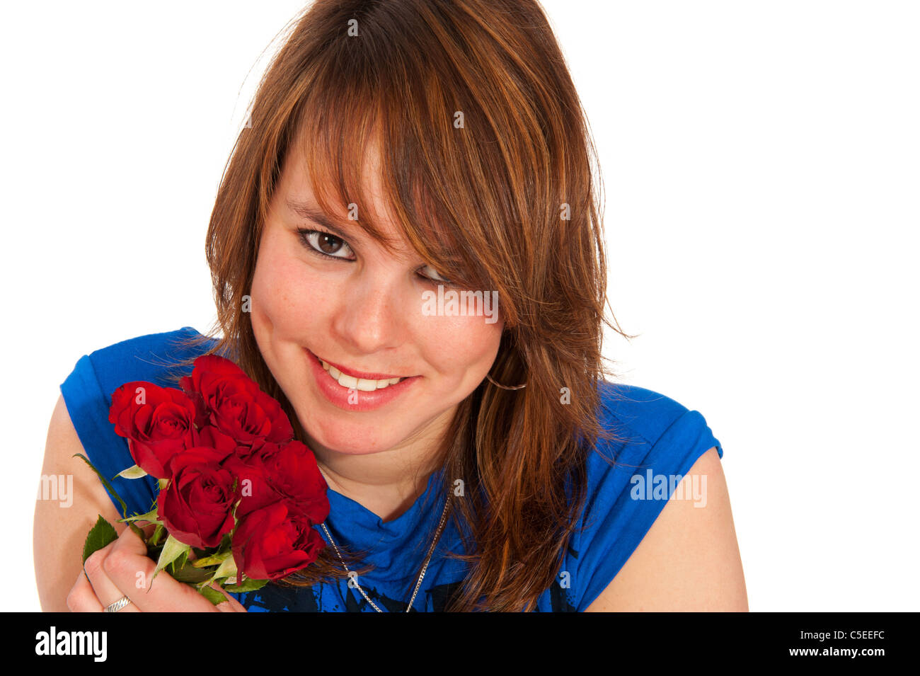 Portrait of an attractive girl with red rose Stock Photo - Alamy