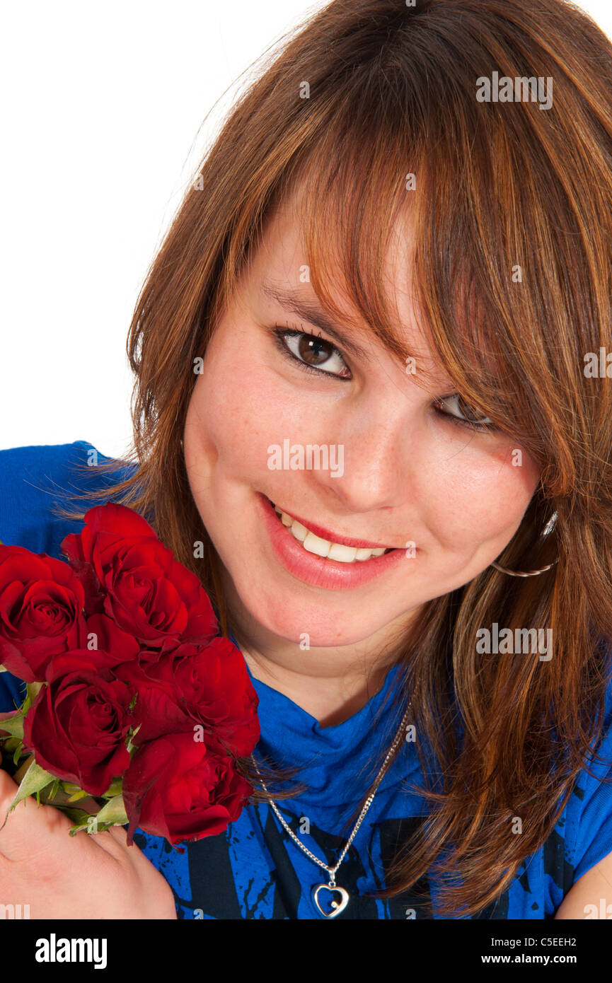 Portrait of an attractive girl with bouquet red roses Stock Photo - Alamy