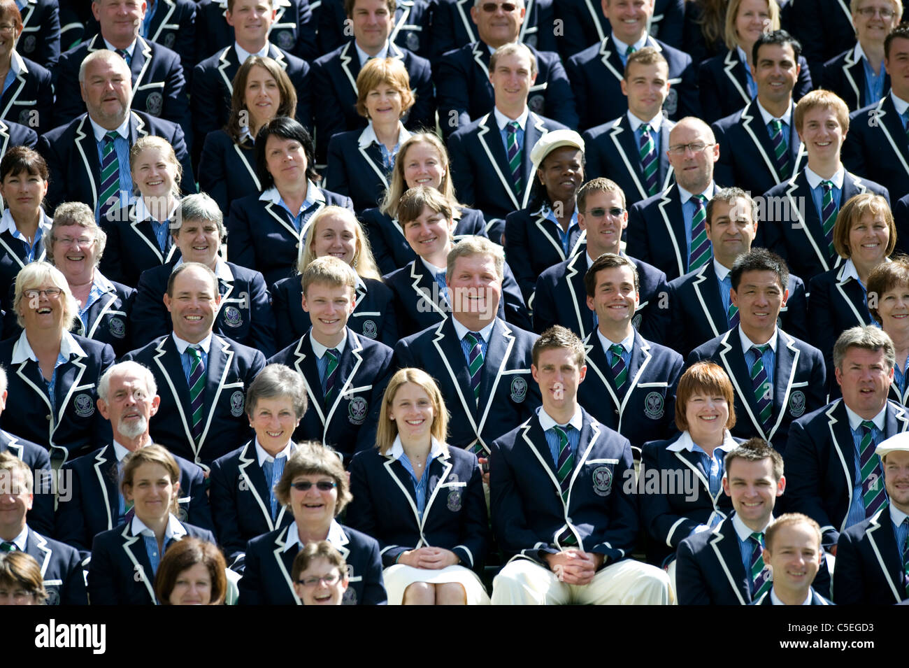 Umpire and line judge group picture on centre court during the 2011 Wimbledon Tennis Championships Stock Photo