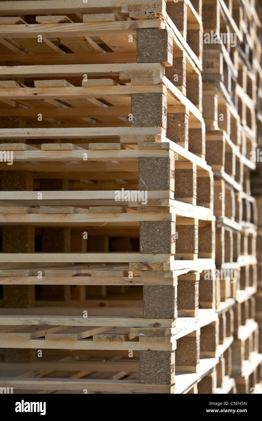 New wooden pallets stacked on harbour quayside Montrose Scotland UK