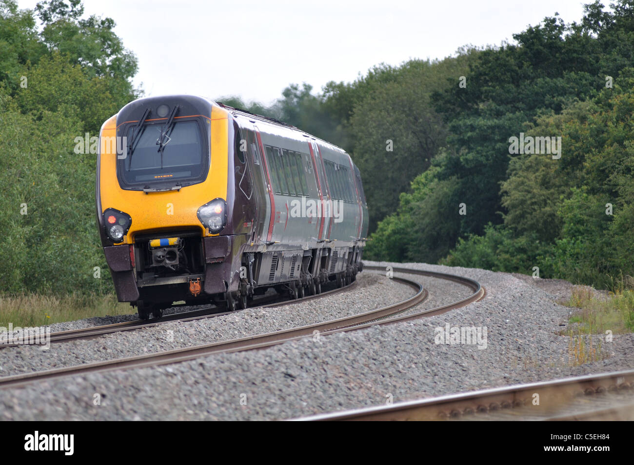 Arriva Cross Country Voyager train going away, Warwickshire, England, UK Stock Photo
