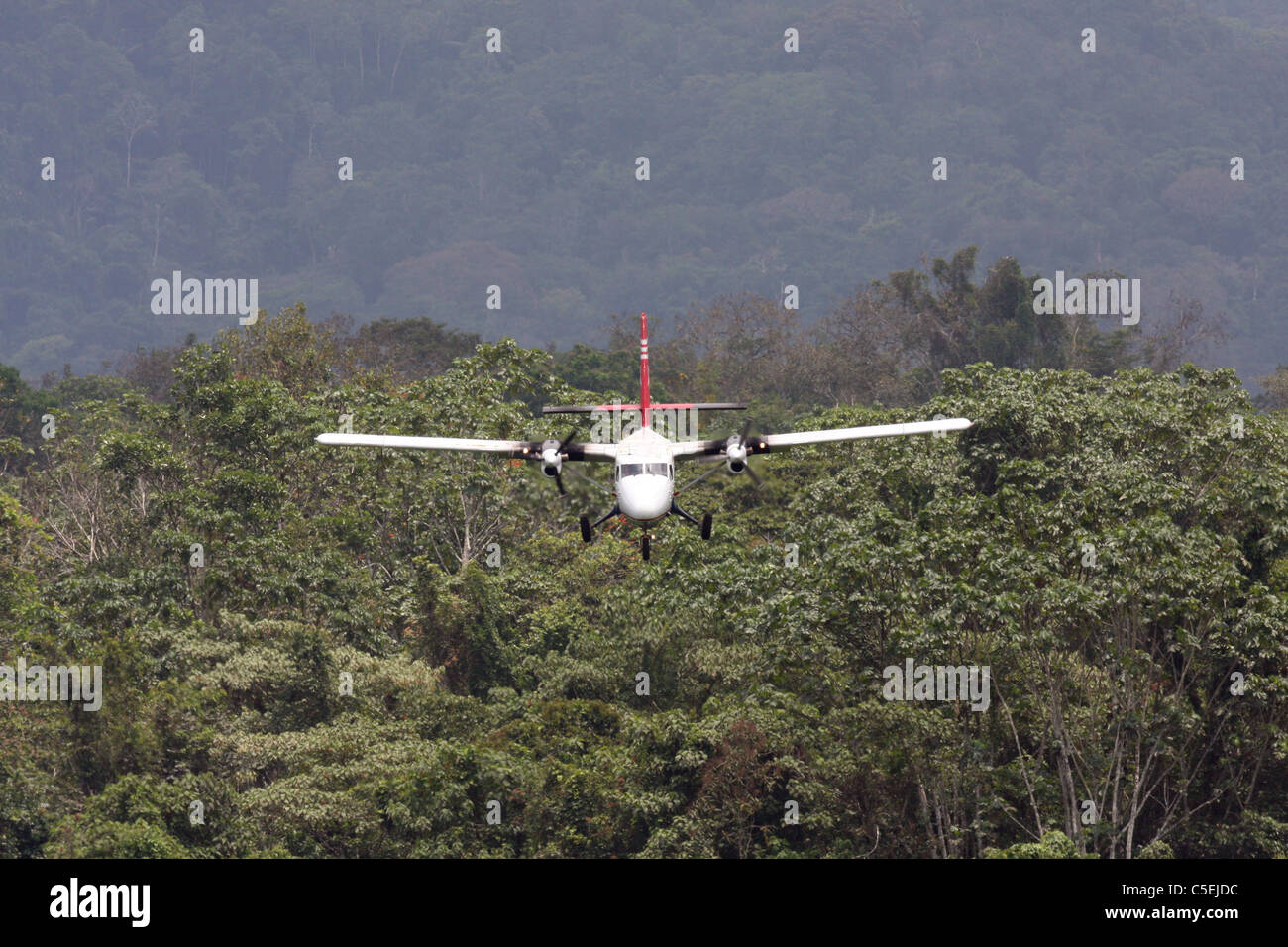 Plane landing on a strip in the rainforest Darien National Park Panama. Stock Photo