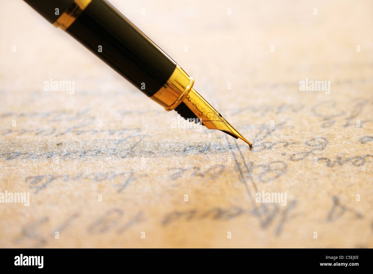 Fountain pen on old letter Stock Photo