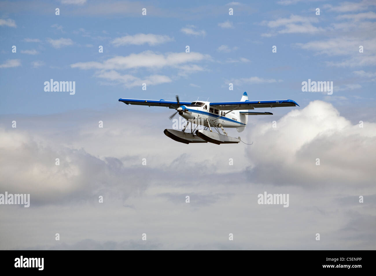 A de Havilland Canada DHC-3 Otter float plane or airplane flies over Puget Sound in the state of Washington Stock Photo
