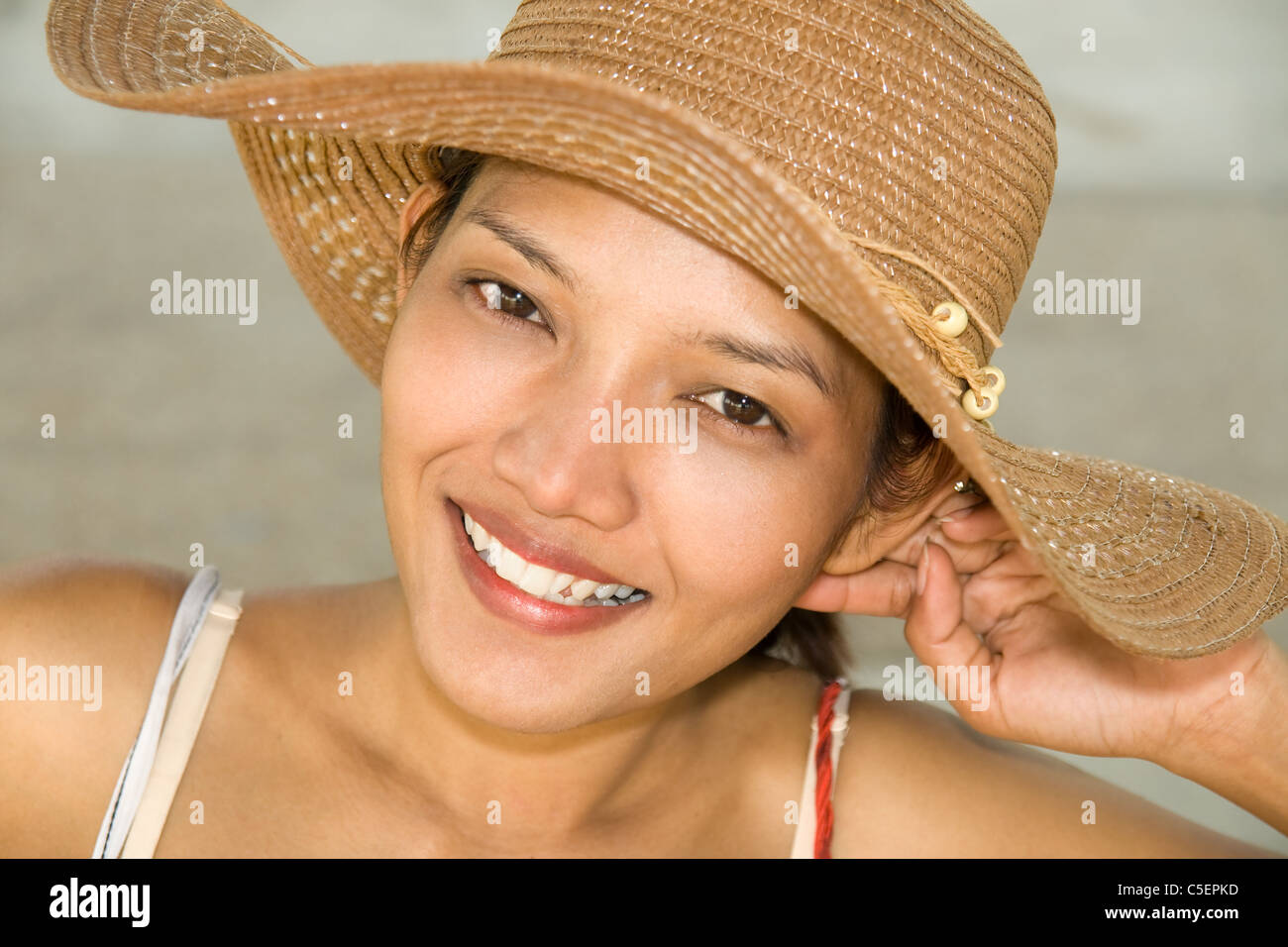Portrait of a young woman in a hat Stock Photo - Alamy