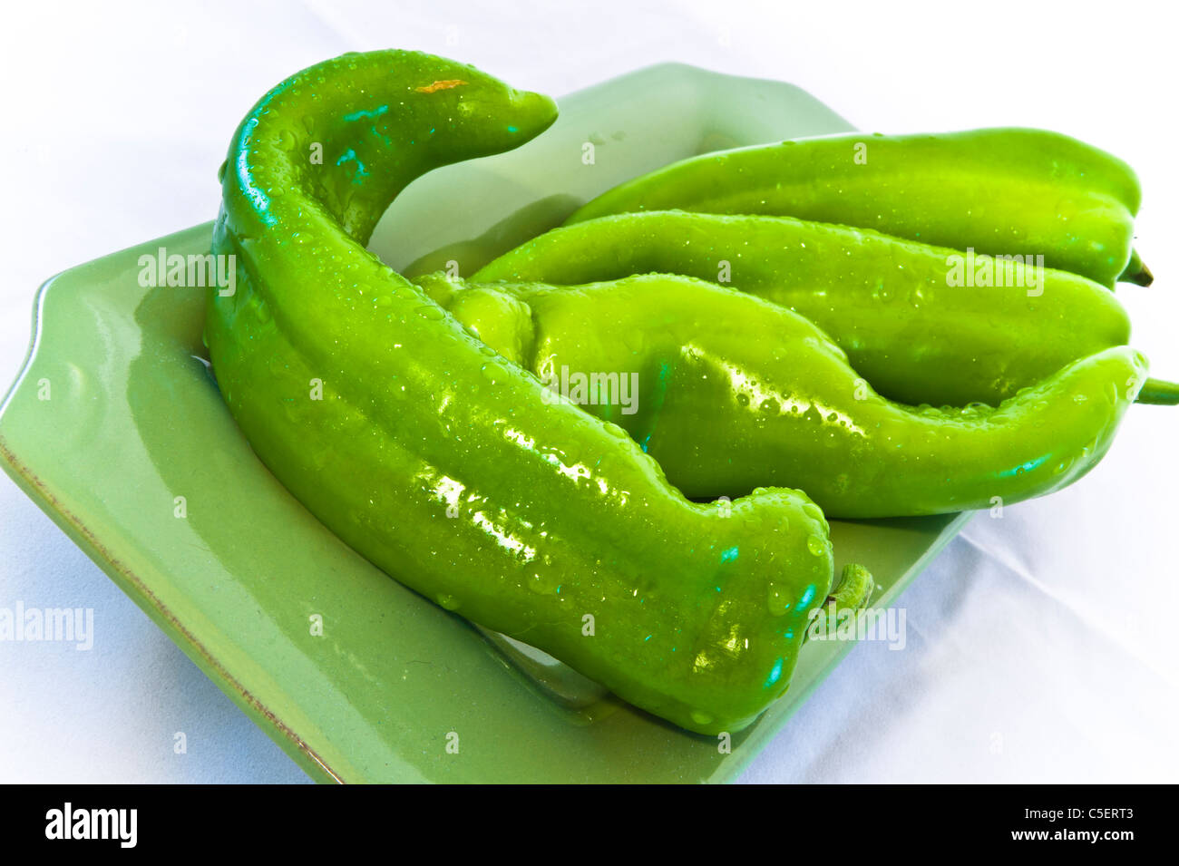 Green chili peppers are large, mild chilies are available in most local grocery stores. Stock Photo