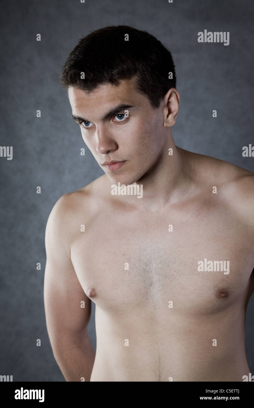 Portrait of beautiful young men on grey background Stock Photo - Alamy