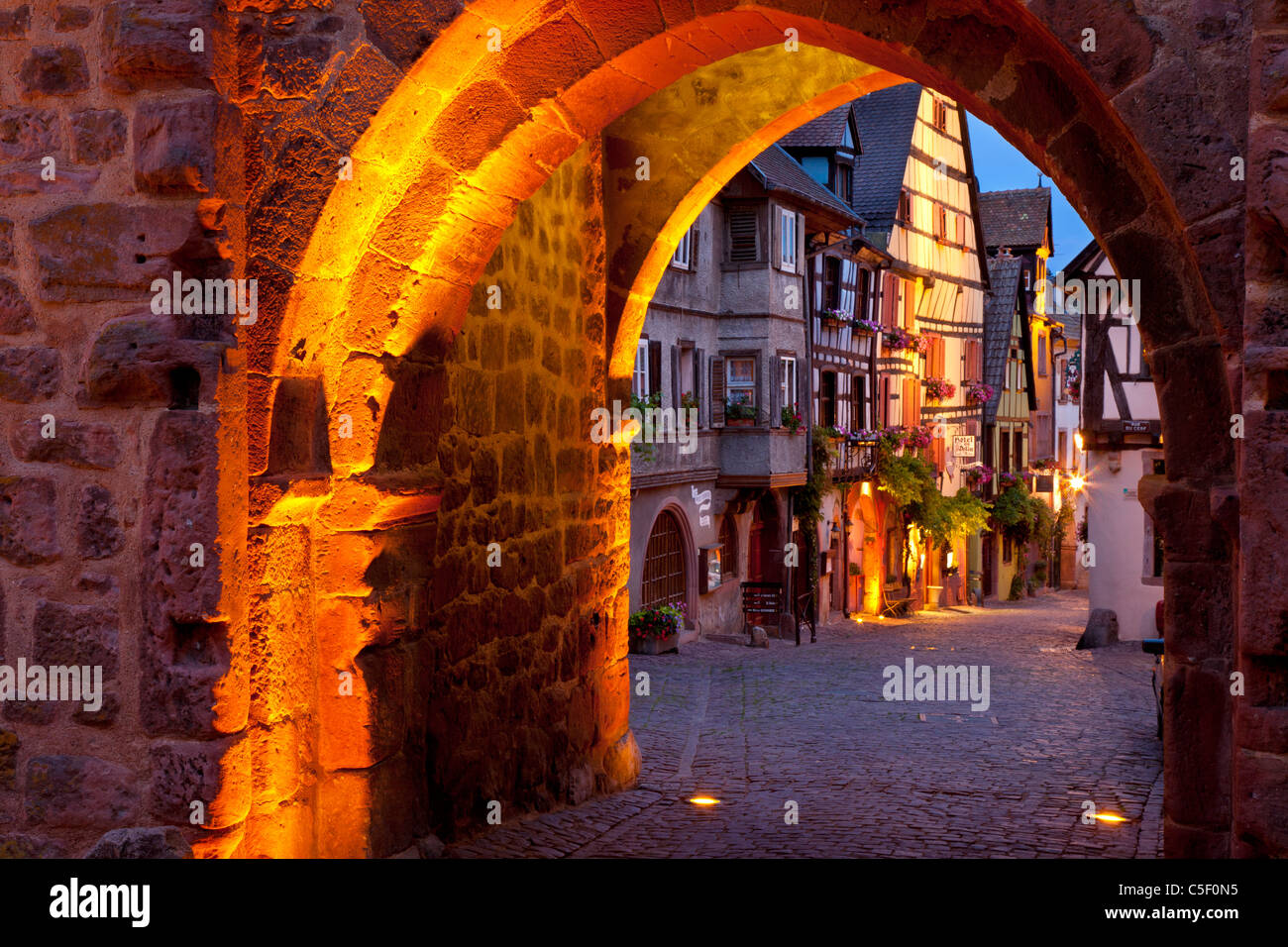 Stone entry gate to medieval village of Riquewihr, along the Wine Route, Alsace Haut-Rhin France Stock Photo