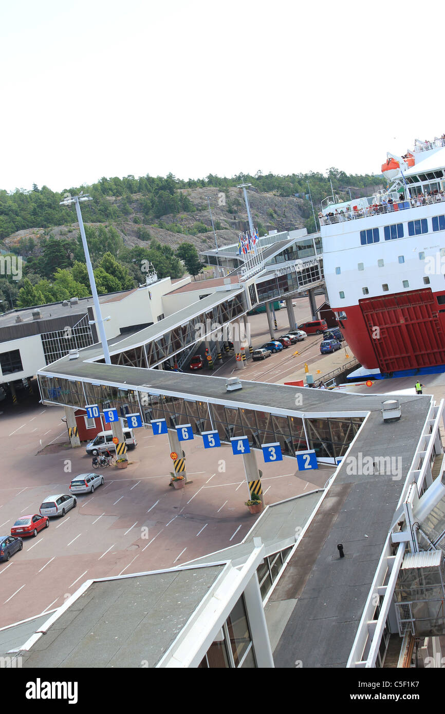 Port of Mariehamn (Maarianhamina) where one of the big ferry boats between Finland and Sweden is been loaded. Stock Photo