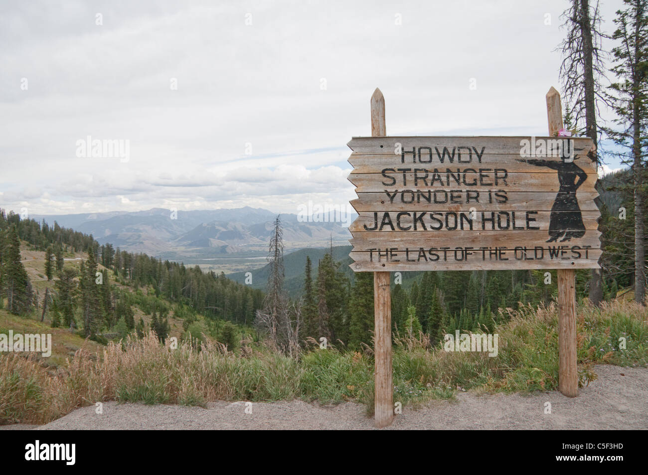 Traveling HWY 22, over Teton pass, down into Jackson Hole, Wyoming, we came upon this fun and unique sign welcoming strangers. Stock Photo