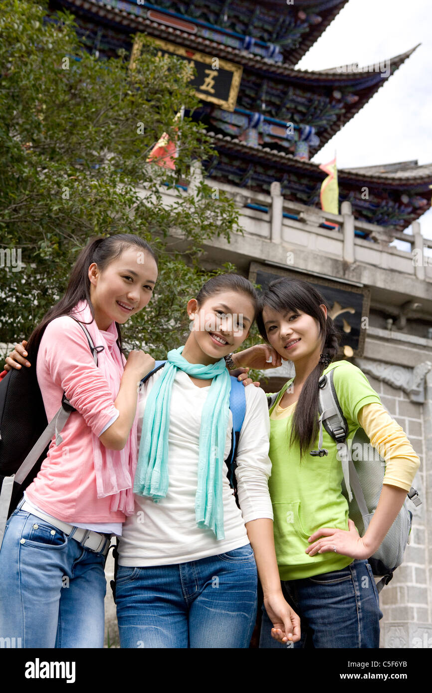 Smiling three women posing hi-res stock photography and images - Alamy