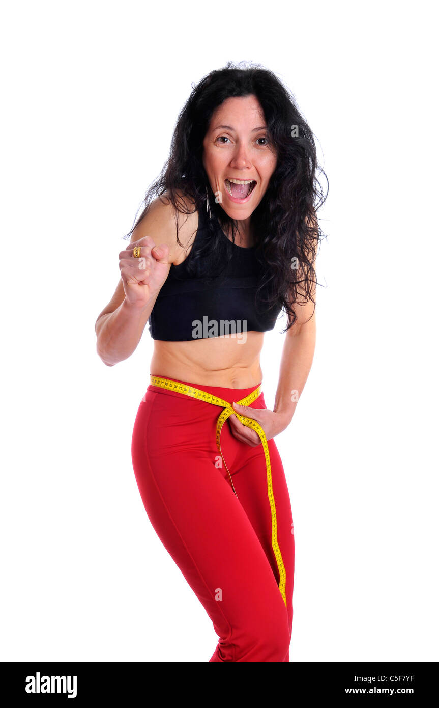 Mature fit woman with measuring tape isolated in white Stock Photo Alamy