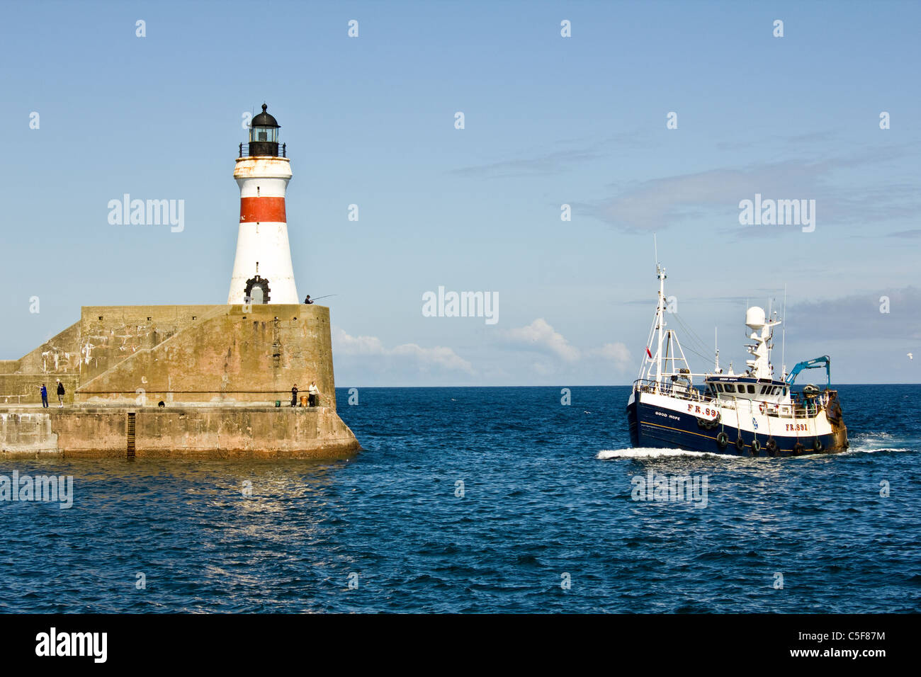 Fishing boat returning to Fraserburgh Stock Photo Alamy