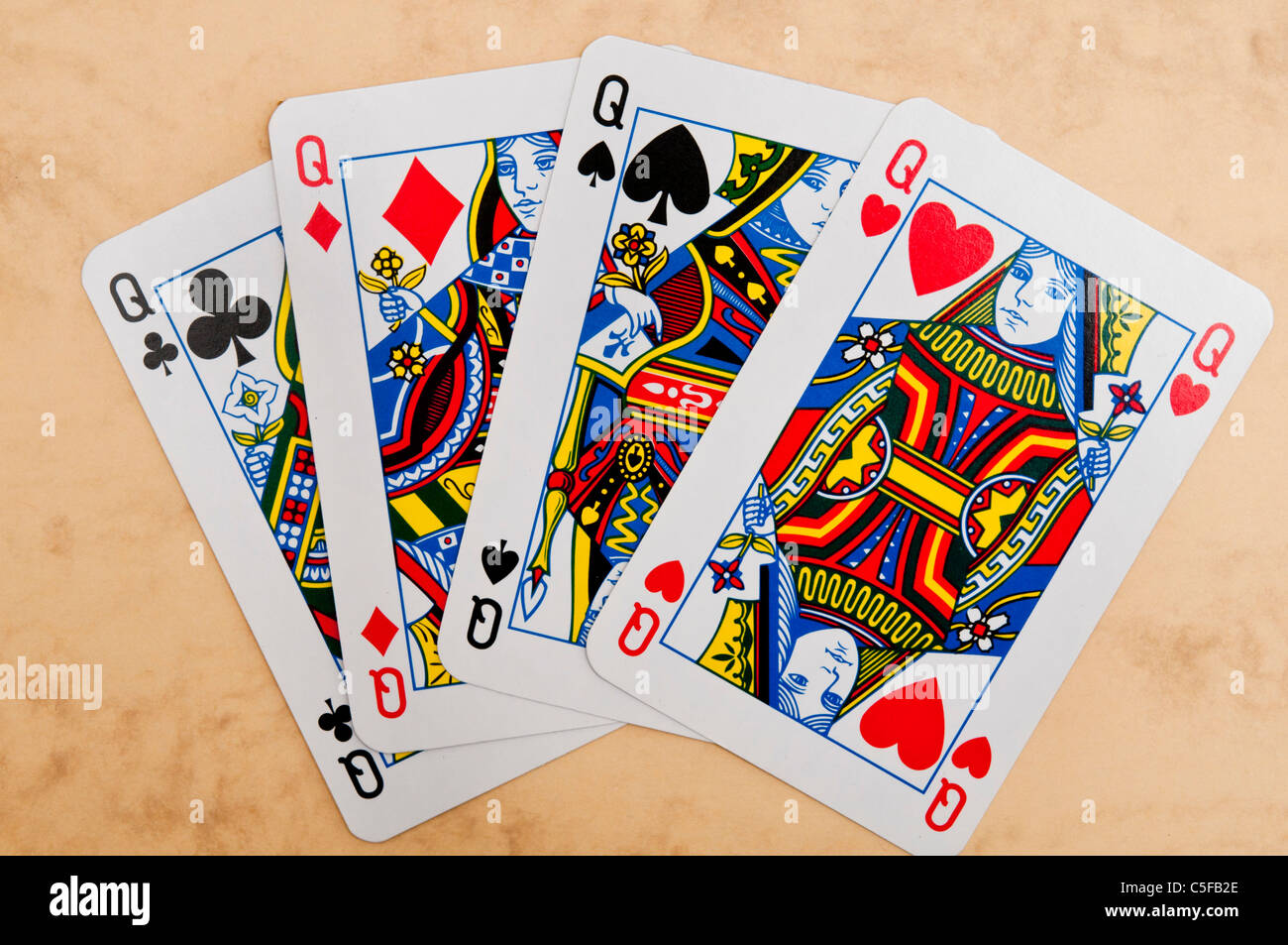 four queens playing cards Stock Photo - Alamy