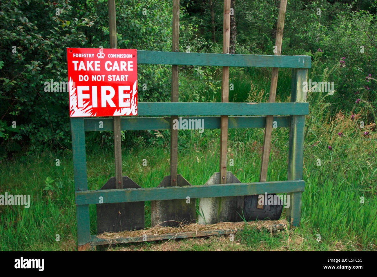 Fire beaters in Forestry Commission forest, Scotland. Stock Photo